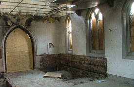 Inside the building before restoration. Select the image to see a larger view